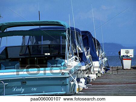 USA, boats docked, rear view View Large Photo Image Stock Photo - USA, boats docked, rear view. Fotosearch