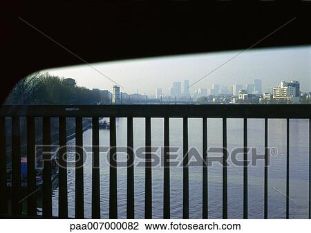 Stock Image - France, Paris, guard rail in front of River Seine . Fotosearch