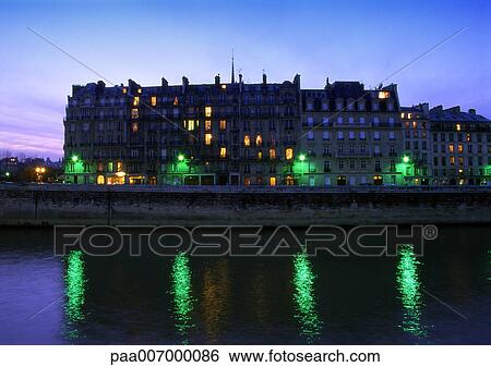 Stock Photograph - France, Paris, River Seine at night. Fotosearch