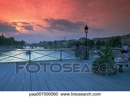 France, Paris, sunset over River Seine seen from Pont des Arts View Large Photo Image Stock Image - France, Paris, sunset over River Seine seen from Pont des Arts. Fotosearch