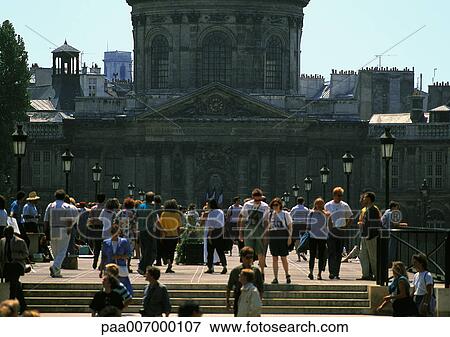 Stock Photo - France, Paris, tourists on Pont des Arts. Fotosearch
