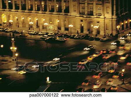 Stock Image - France, Paris, traffic at Place de la Concorde at night, high angle view. Fotosearch