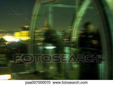 Stock Image - France, Paris, view from Pompidou center at night, blurred. Fotosearch