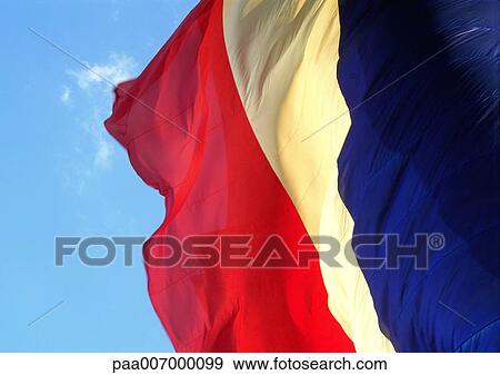 French flag blowing in winde, close-up View Large Photo Image Stock Photo - French flag blowing in winde, close-up. Fotosearch