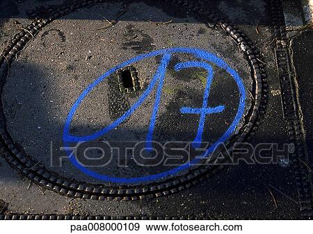 17 painted on man hole cover. View Large Photo Image Stock Photo - 17 painted on man hole cover.. Fotosearch