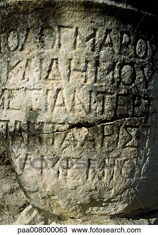 Ancient Greek manuscript engraved in stone. View Large Photo Image Stock Image - Ancient Greek manuscript engraved in stone.. Fotosearch