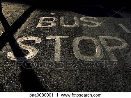 Bus Stop painted text on street. View Large Photo Image Stock Image - Bus Stop painted text on street.. Fotosearch