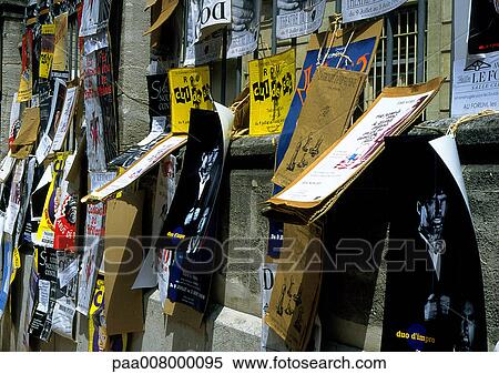 Collection of posters and signs on wall. View Large Photo Image Stock Photography - Collection of posters and signs on wall.. Fotosearch
