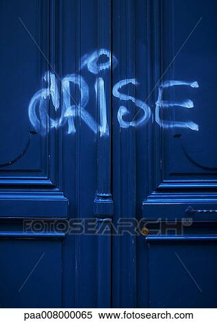 Crisis graffiti in French on doors. View Large Photo Image Stock Photography - Crisis graffiti in French on doors.. Fotosearch