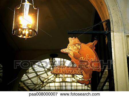 French bookshop sign with hanging light. View Large Photo Image Stock Photo - French bookshop sign with hanging light.. Fotosearch