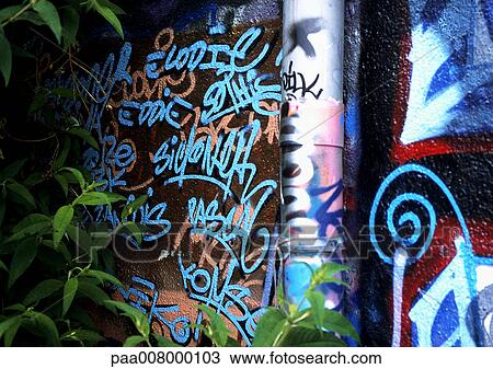 Graffiti on wall. View Large Photo Image Stock Image - Graffiti on wall.. Fotosearch