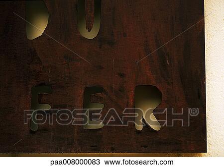 Iron cut out text in French View Large Photo Image Stock Image - Iron cut out text in French. Fotosearch