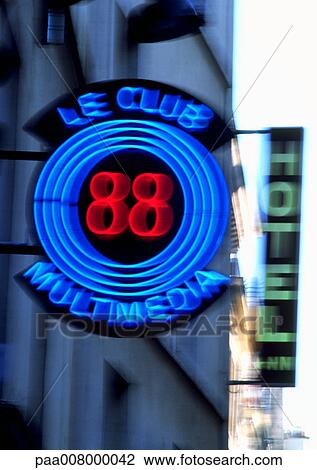 Le Club Multimedia neon sign with "Hotel" sign in background, blurred View Large Photo Image Stock Image - Le Club Multimedia neon sign with "Hotel" sign in background, blurred. Fotosearch
