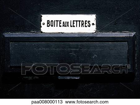 Stock Image - Letter box sign in French over mail box.. Fotosearch