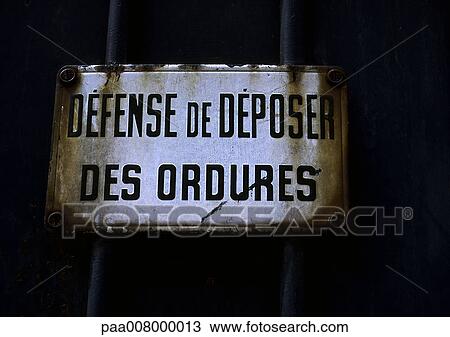No dumping rusted sign in French View Large Photo Image Stock Image - No dumping rusted sign in French. Fotosearch