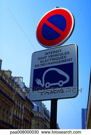 No parking except for electric vehicles recharging street sign in French View Large Photo Image Stock Image - No parking except for electric vehicles recharging street sign in French. Fotosearch