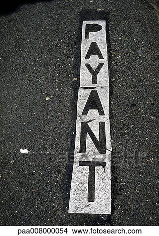 Paid parking typography in French on street. View Large Photo Image Picture - Paid parking typography in French on street.. Fotosearch
