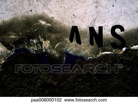 Stock Image - Printed letters on torn surface. Fotosearch
