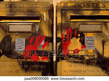 Stock Photo - Red hand prints on post office boxes.. Fotosearch