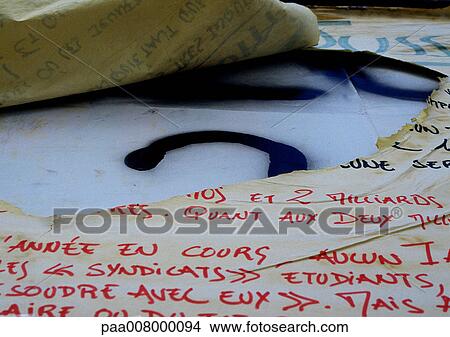 Ripped paper with handwriting in French View Large Photo Image Picture - Ripped paper with handwriting in French. Fotosearch
