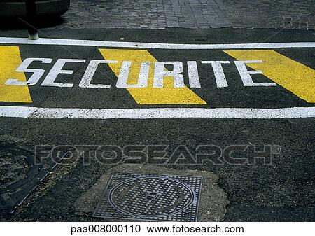 Safety stenciled text in French on street. View Large Photo Image Stock Image - Safety stenciled text in French on street.. Fotosearch