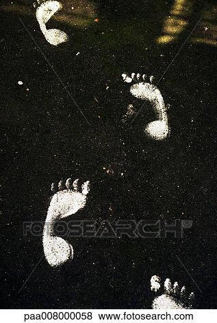 White foot prints on street. View Large Photo Image Stock Photo - White foot prints on street.. Fotosearch