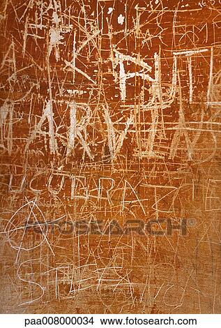 Words scratched on surface, full frame View Large Photo Image Picture - Words scratched on surface, full frame. Fotosearch