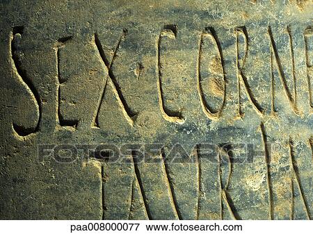 Writing engraved in stone wall. View Large Photo Image Stock Photo - Writing engraved in stone wall.. Fotosearch
