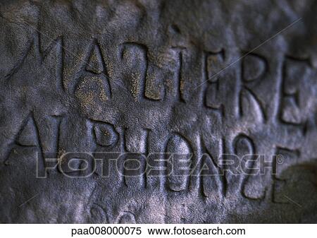 Writing engraved in stone wall. View Large Photo Image Stock Photography - Writing engraved in stone wall.. Fotosearch