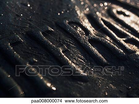 Writing on stone, relief. View Large Photo Image Picture - Writing on stone, relief.. Fotosearch