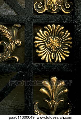 Brass floral motif, close-up View Large Photo Image Stock Photo - Brass floral motif, close-up. Fotosearch