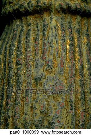 Carved false column with worn gilding, close-up View Large Photo Image Stock Photo - Carved false column with worn gilding, close-up. Fotosearch