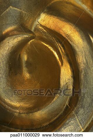 Gold inlay accent, close-up View Large Photo Image Stock Photo - Gold inlay accent, close-up. Fotosearch