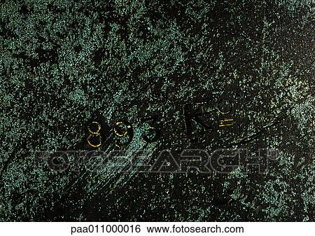 Mottled surface with numbers and letter, close-up View Large Photo Image Stock Photograph - Mottled surface with numbers and letter, close-up. Fotosearch