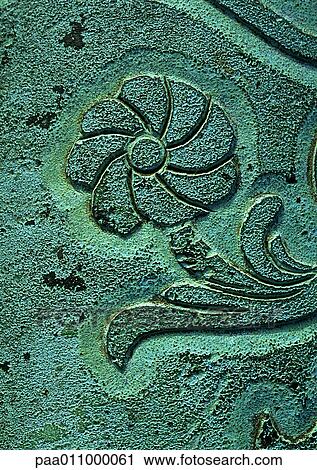 Painted blue stone carved with flower, close-up View Large Photo Image Stock Image - Painted blue stone carved with flower, close-up. Fotosearch