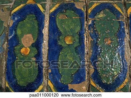 Stock Image - Painted ceramic tiles, close-up. Fotosearch