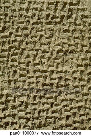 Stock Photo - Pattern carved in stone, close-up. Fotosearch