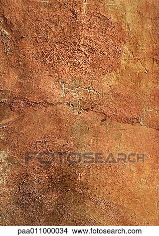 Terracotta colored wall, close-up View Large Photo Image Picture - Terracotta colored wall, close-up. Fotosearch