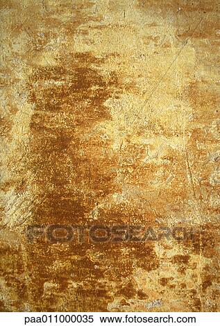 Stock Photography - Yellowing, brownish wall, close-up. Fotosearch