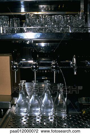 Stock Image - Carafes of water in cafe. Fotosearch