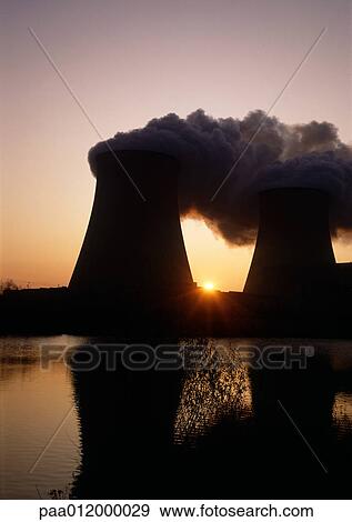 Nuclear reactors reflected in water at sunrise View Large Photo Image Stock Photo - Nuclear reactors reflected in water at sunrise. Fotosearch