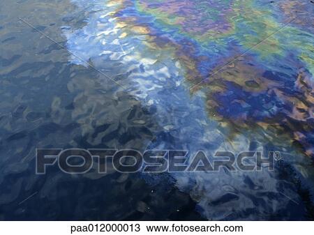 Oil on surface of water View Large Photo Image Stock Image - Oil on surface of water. Fotosearch