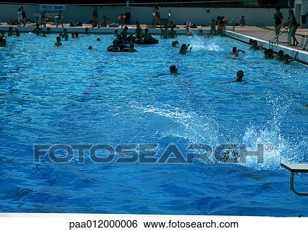 Stock Photograph - People in swimming pool. Fotosearch
