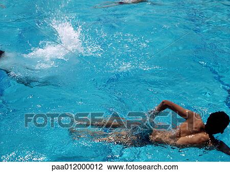 People swimming in pool View Large Photo Image Stock Image - People swimming in pool. Fotosearch