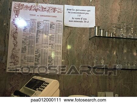 Sign on wall of cafe stating that non-customers must pay 1 franc for a glass of water View Large Photo Image Stock Image - Sign on wall of cafe stating that non-customers must pay 1 franc for a glass of water. Fotosearch