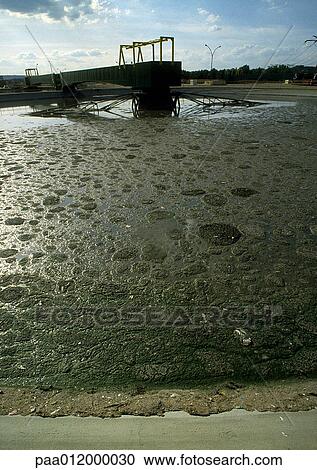 Stock Image - Water at sewage treatment plant. Fotosearch