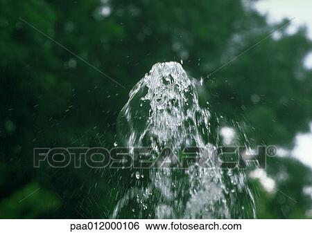 Stock Photograph - Water spraying into air. Fotosearch