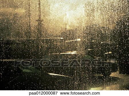Wet window if front of traffic View Large Photo Image Stock Photo - Wet window if front of traffic. Fotosearch