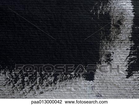Stock Image - Black ink on texture paper, extreme close up.. Fotosearch