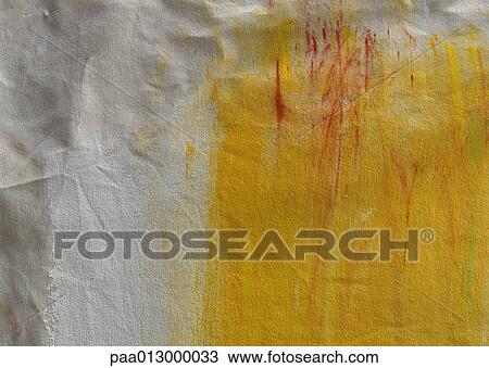 Stock Image - Red and yellow paint on paper, close-up, full frame. Fotosearch